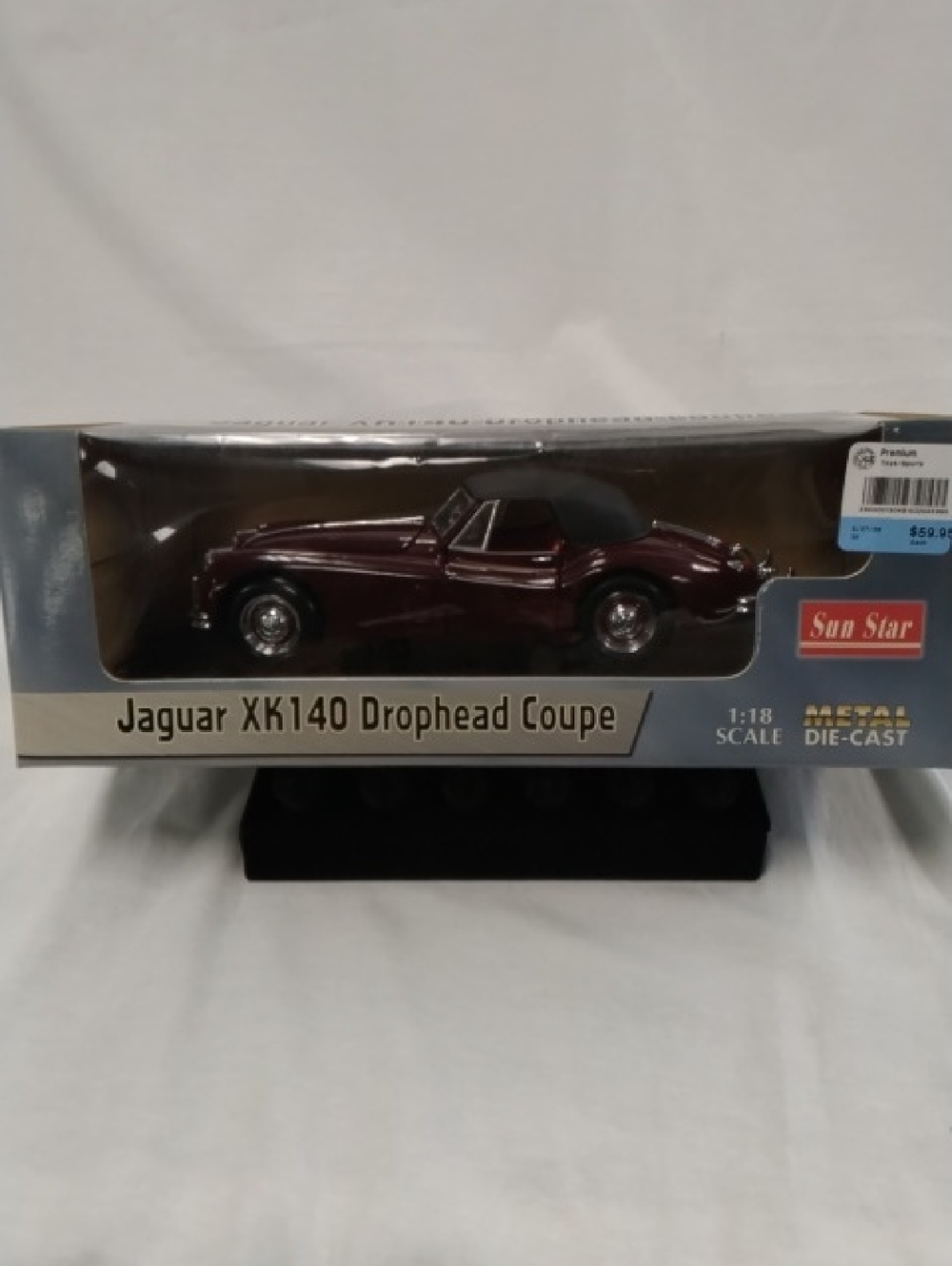 Jaguar XK140 Drophead Coupe Die-Cast Model - Maroon Scale 1:18